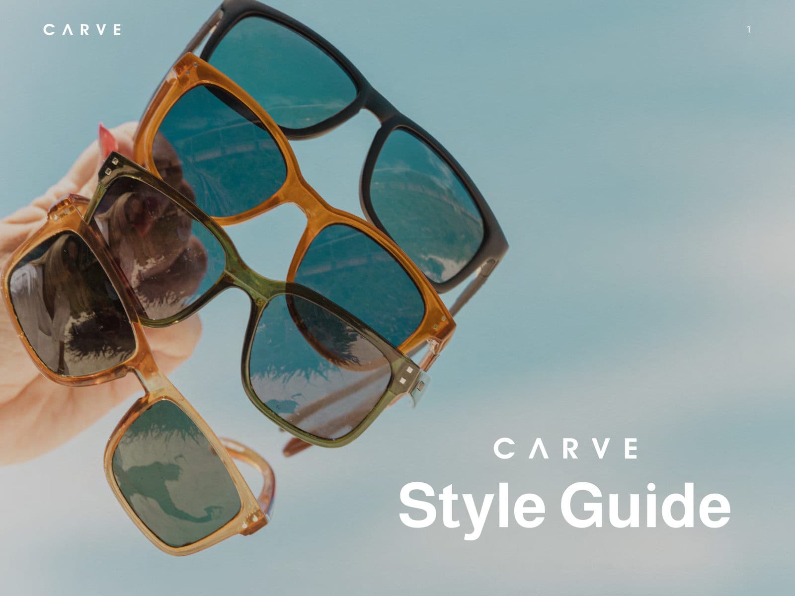 CARVE style guide cover with sunglasses held against the sky