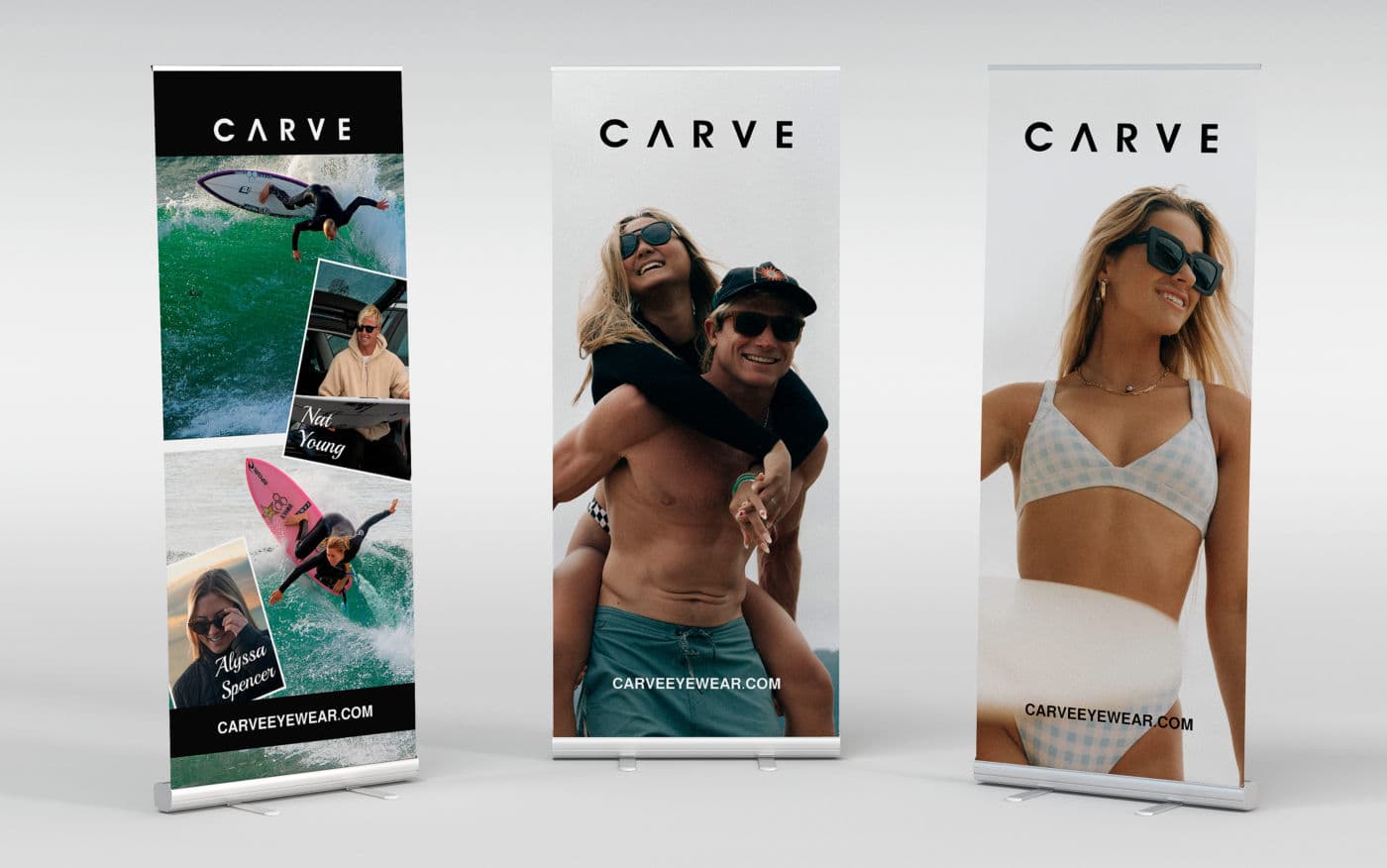 Three CARVE roll-up banners with surf and lifestyle photography